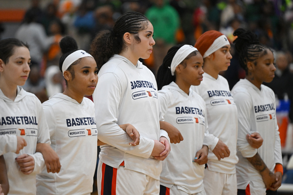 The Morgan State women's basketball team line up for the national anthem before an NCAA college basketball game, Wednesday, Nov. 12, 2025, in Baltimore. (AP Photo/Gail Burton)