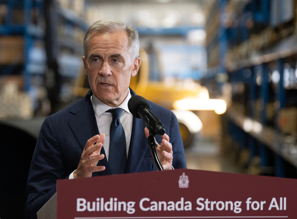 Canada's Prime Minister Mark Carney announces a proposed pipeline from Alberta to the B.C. coast in Calgary, Thursday, July 02, 2026. (Todd Korol/The Canadian Press via AP)