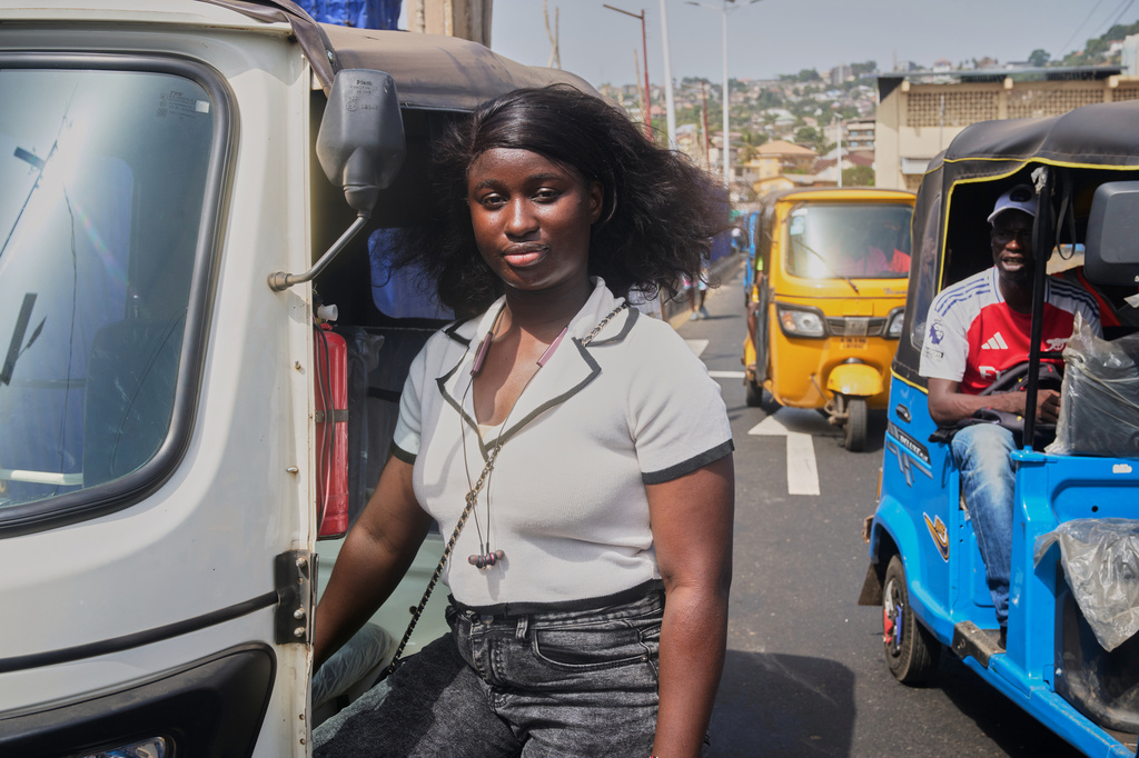 Halimatu Kamara, a rickshaw driver poses for a portrait in Freetown, Sierra Leone, March 7, 2026. (AP Photo/Abdul Hamid Kanu)