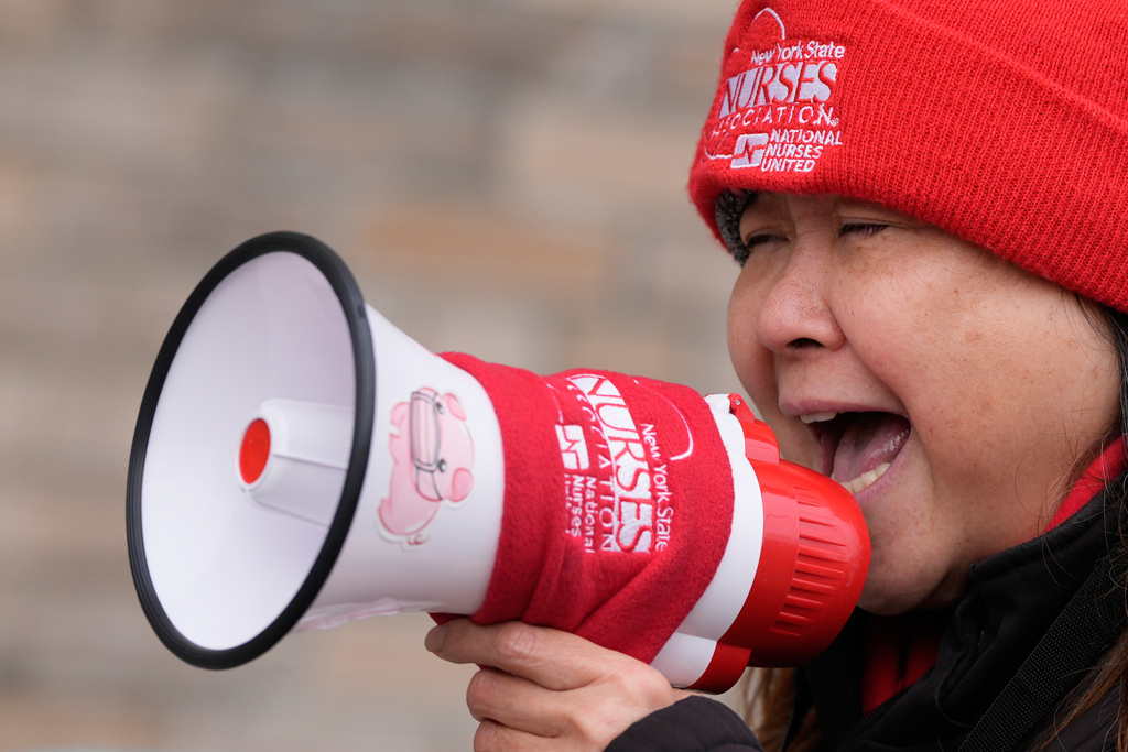 Nurses and their supporters strike in front of NewYork-Presbyterian hospital in New York, Thursday, Feb. 19, 2026. (AP Photo/Seth Wenig)
