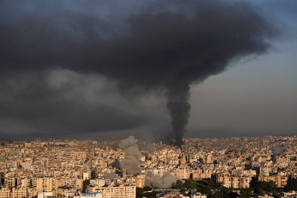 Smoke rises from Israeli airstrikes in Dahiyeh, a southern suburb of Beirut, Lebanon, Tuesday, March 3, 2026. (AP Photo/Hussein Malla)
