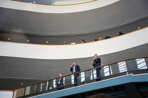 FILE - People work inside the United Nations Headquarters on the first day of the 80th session of the U.N. General Assembly, Monday, Sept. 22, 2025. (AP Photo/Angelina Katsanis, File) FILE - People work inside the United Nations Headquarters on the first day of the 80th session of the U.N. General Assembly, Monday, Sept. 22, 2025. (AP Photo/Angelina Katsanis, File)