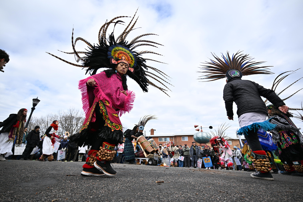 Maryanne Quiroz, lead dancer with Kalpulli Yaocenoxtli, performs at Western Park during"No Kings" protest Saturday, March 28, 2026, in St. Paul, Minn. (AP Photo/Tom Baker)