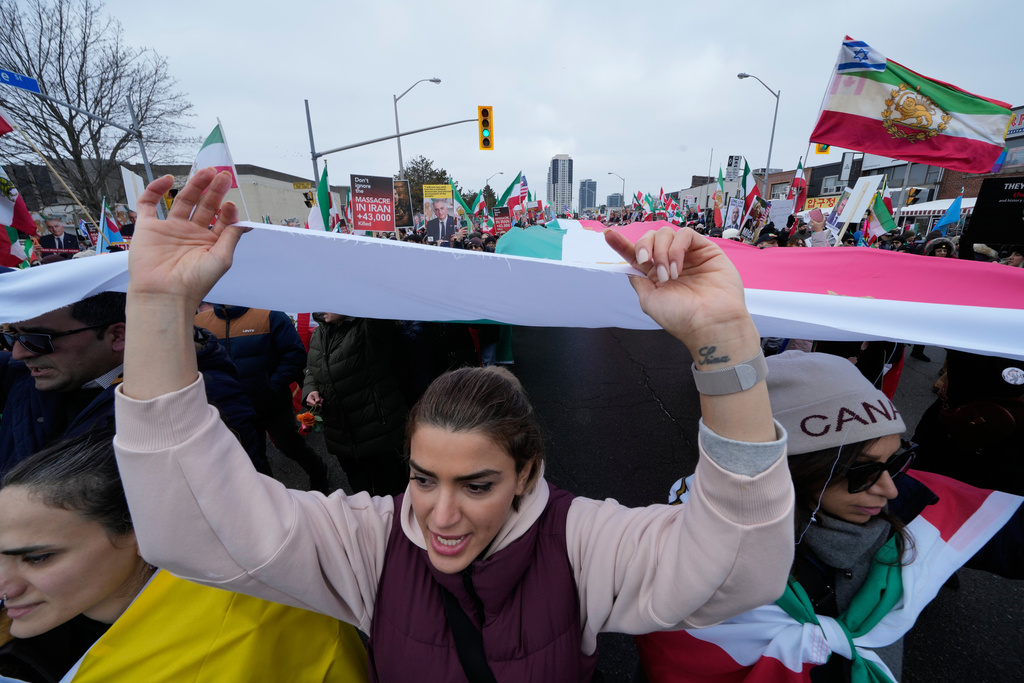 Supporters of Iran's exiled Crown Prince Reza Pahlavi attend a demonstration in Toronto, Saturday, Feb. 14, 2026. (AP Photo/Kamran Jebreili)