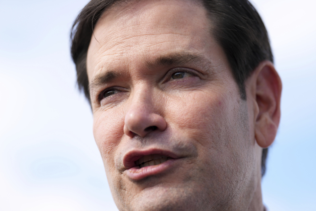 Secretary of State Marco Rubio speaks to reporters before boarding his plane at Homestead Air Reserve Base in Homestead, Fla., en route to Mexico City, Tuesday, Sept. 2, 2025. (AP Photo/Jacquelyn Martin, pool)