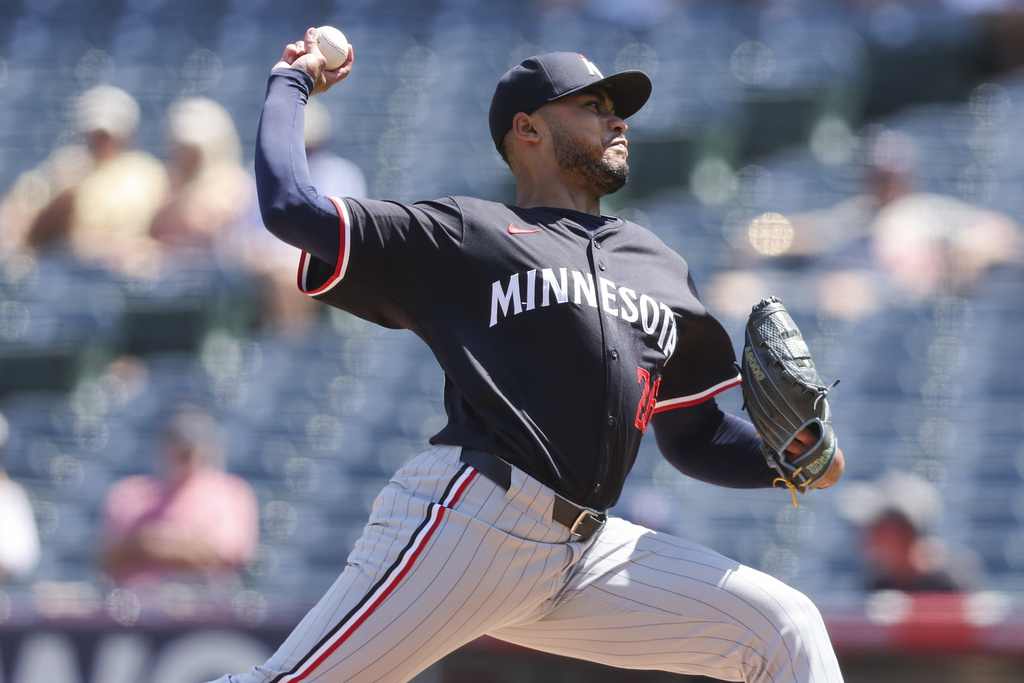 Minnesota Twins pitcher Taj Bradley (26) throws to a Los Angeles Angels batter during the first inning of a baseball game, Wednesday, Sept. 10, 2025, in Anaheim, Calif. (AP Photo/Jessie Alcheh)
