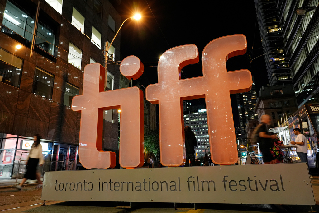 FILE - A sign for the Toronto International Film Festival appears on the opening night of the festival in Toronto on Sept. 5, 2024. (AP Photo/Chris Pizzello, File)