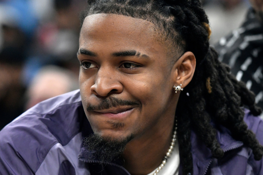 Memphis Grizzlies guard Ja Morant looks on from the bench in the first half of an NBA basketball game against the Los Angeles Clippers Saturday, March 7, 2026, in Memphis, Tenn. (AP Photo/Brandon Dill)