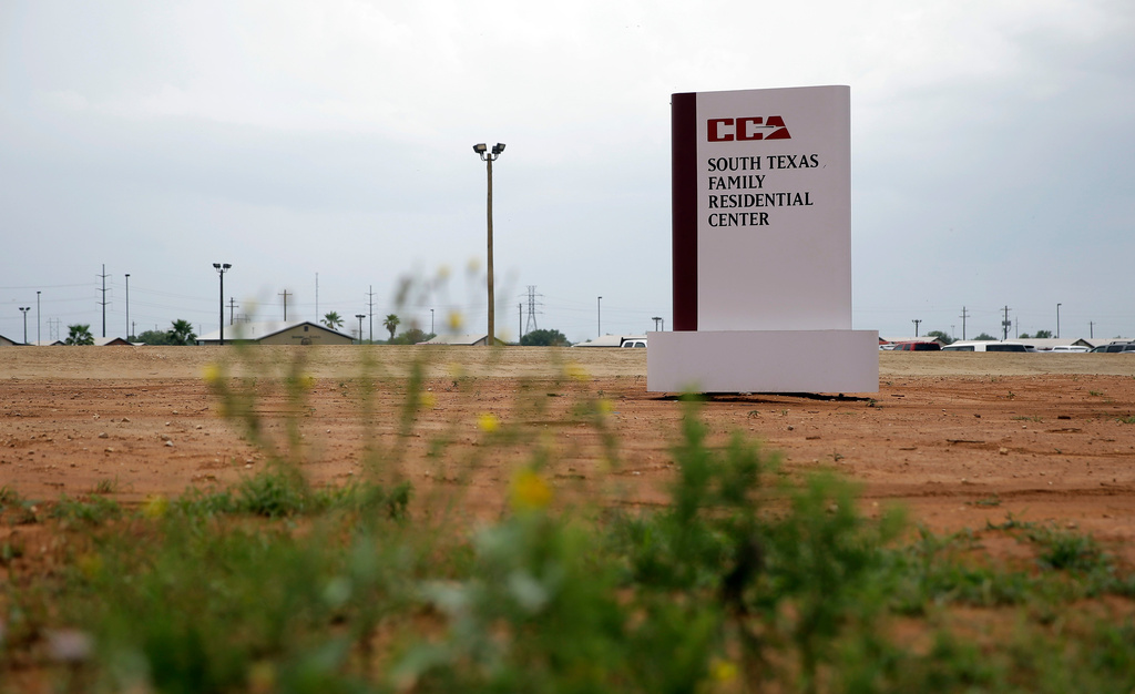 FILE - A sign stands at the entrance to the South Texas Family Residential Center in Dilley, Texas. (AP Photo/Eric Gay, File)
