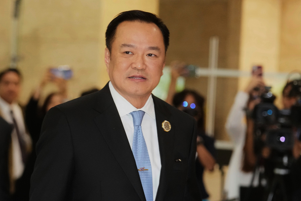 Leader of Bhumjai Thai Party Anutin Charnvirakul arrives at Parliament in Bangkok, Thailand, Friday, Sept. 5, 2025. (AP Photo/Sakchai Lalit)