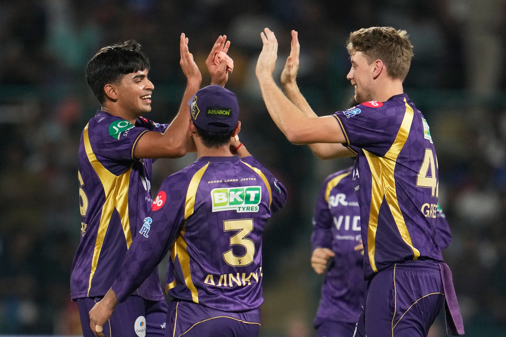 Kolkata Knight Riders' Kartik Tyagi, left, celebrates with teammates the wicket of Delhi Capitals' KL Rahul during the Indian Premier League cricket match between Delhi Capitals and Kolkata Knight Riders in New Delhi, India, Friday, May 8, 2026. (AP Photo/Manish Swarup)