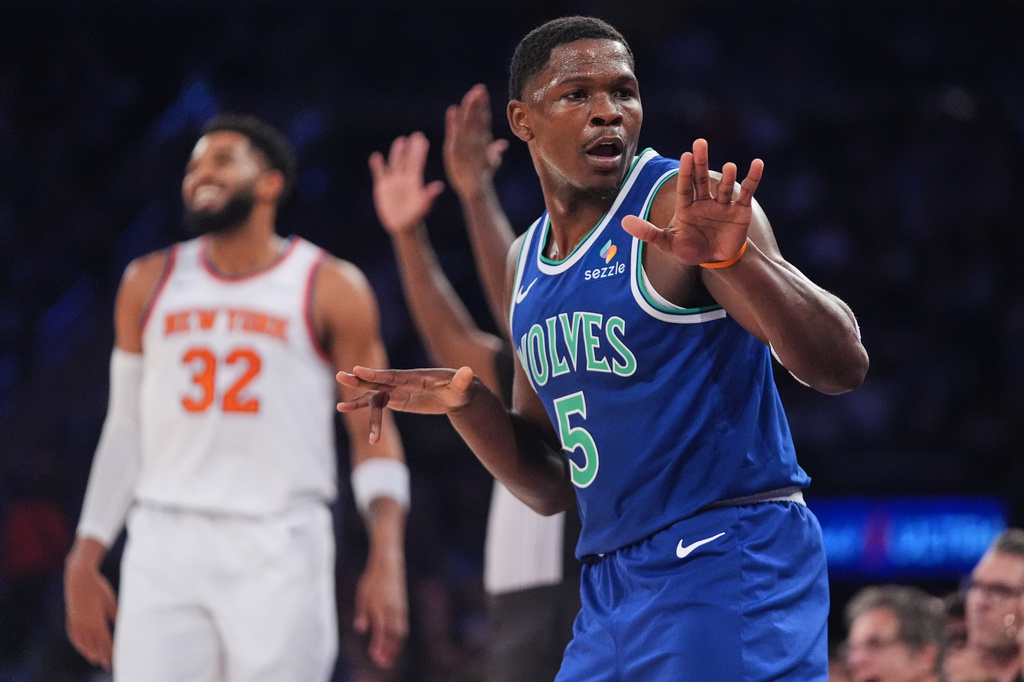 Minnesota Timberwolves' Anthony Edwards (5) gestures to fans after making a three-point shot during the first half of a preseason NBA basketball game against the New York Knicks Monday, Oct. 12, 2026, in New York. (AP Photo/Frank Franklin II)