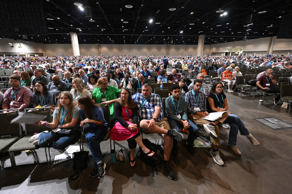 Attendees listen as presentations are discussed during the annual meeting of the Southern Baptist Convention, Tuesday, June 9, 2026, in Orlando, Fla. (AP Photo/Phelan M. Ebenhack)