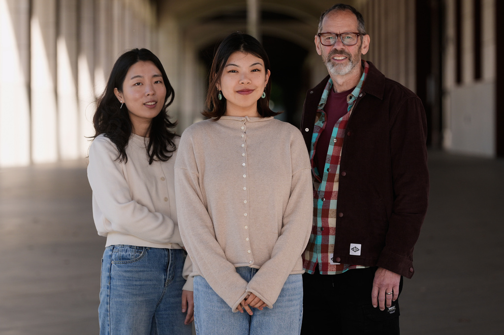 Cinoo Lee, Stanford postdoctoral fellow in psychology, from left, Myra Cheng, Stanford Ph.D. candidate in computer science, Stanford University, and Dan Jurafsky, Stanford professor of computer science and linguistics, pose for photos on the university campus in Stanford, Calif., Thursday, March 26, 2026. (AP Photo/Jeff Chiu)