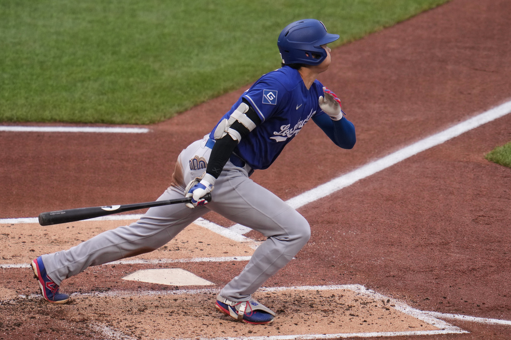 Los Angeles Dodgers' Shohei Ohtani (17) watches his solo home run off Pittsburgh Pirates pitcher Mitch Keller during the third inning of a baseball game in Pittsburgh, Thursday, June 11, 2026. (AP Photo/Gene J. Puskar)