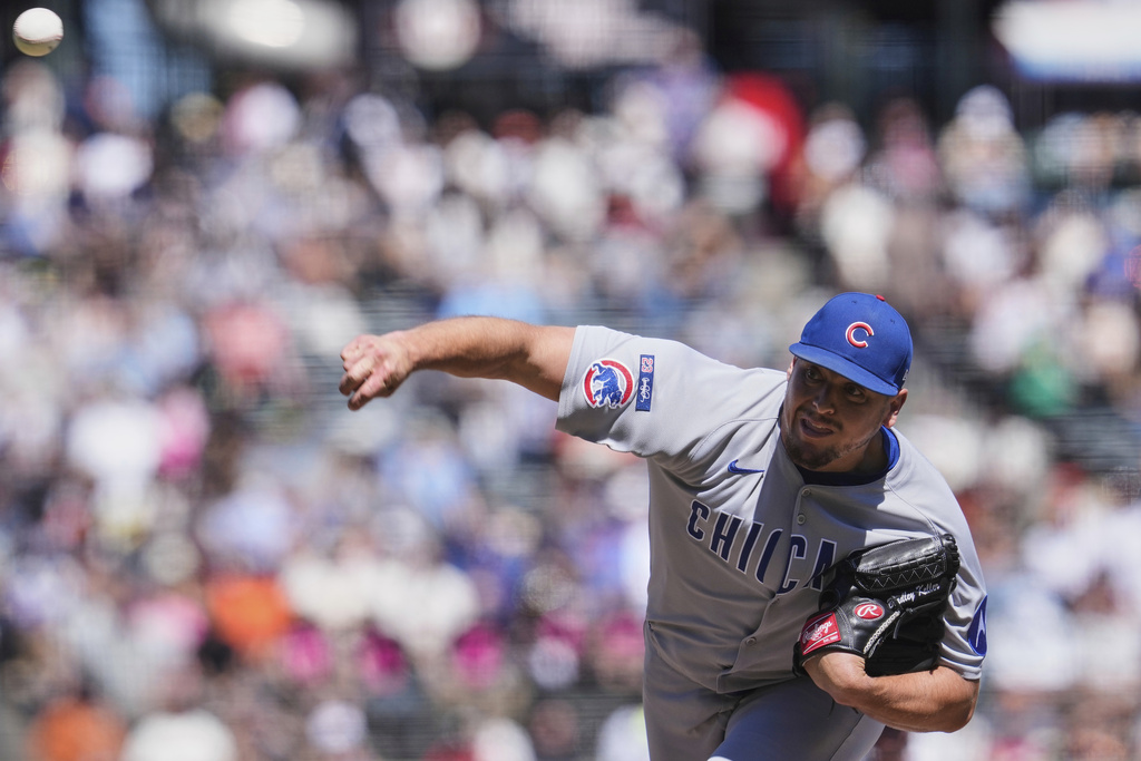 Chicago Cubs pitcher Brad Keller throws to a San Francisco Giants batter during the eighth inning of a baseball game, Thursday, Aug. 28, 2025, in San Francisco. (AP Photo/Godofredo A. Vásquez)