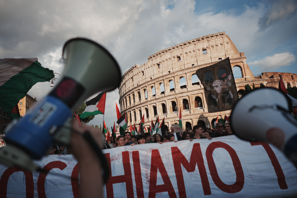 People stage a protest after activists attempting to break Israel's maritime blockade of Gaza say Israeli forces have intercepted their "Global Sumud Flotilla" near the southern Greek island of Crete, in Rome, Thursday, April 30, 2026. (AP Photo/Andrew Medichini)