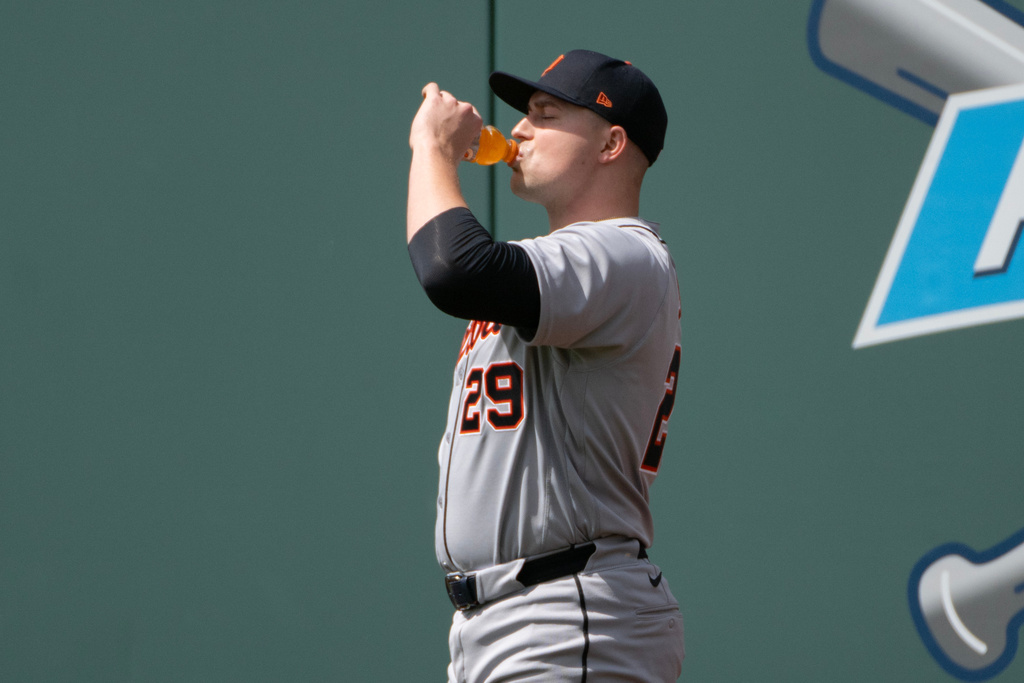 Detroit Tigers starting pitcher Tarik Skubal takes a break as he warms up before a baseball game against the Cleveland Guardians, Saturday, June 13, 2026, in Cleveland. (AP Photo/Phil Long)