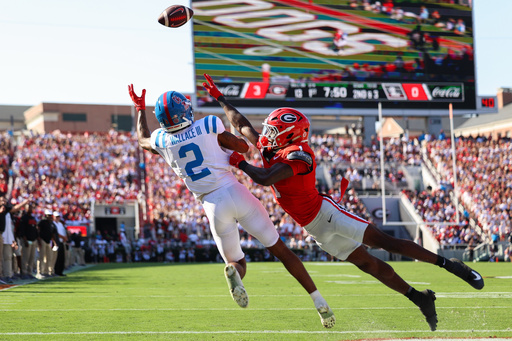 Mississippi wide receiver Harrison Wallace III (2) tries to catch a pass against Georgia defensive back Ellis Robinson IV, right, during the first half of an NCAA college football game Saturday, Oct. 18, 2025, in Athens, Ga. (AP Photo/Colin Hubbard) Mississippi wide receiver Harrison Wallace III (2) tries to catch a pass against Georgia defensive back Ellis Robinson IV, right, during the first half of an NCAA college football game Saturday, Oct. 18, 2025, in Athens, Ga. (AP Photo/Colin Hubbard)