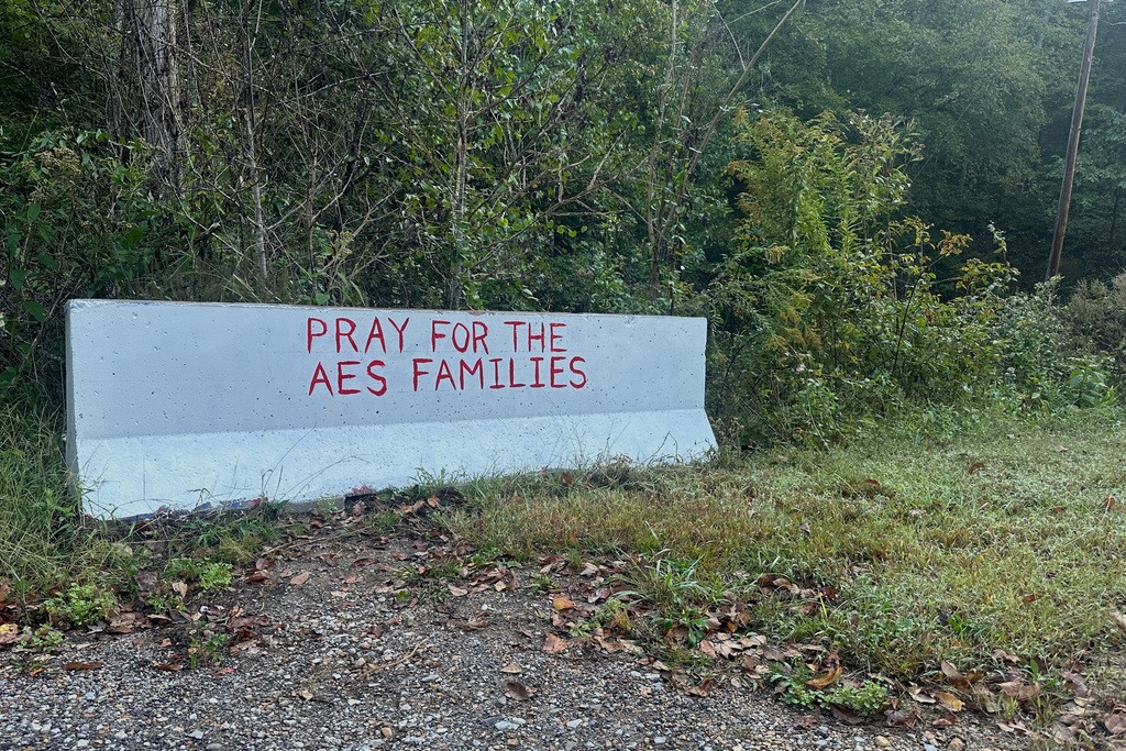 A sign is displayed near the site of an explosion at a explosives manufacturing plant about 60 miles southwest of Nashville, Tenn., on Saturday, Oct. 11, 2025. (AP Photo/Adrian Sainz)