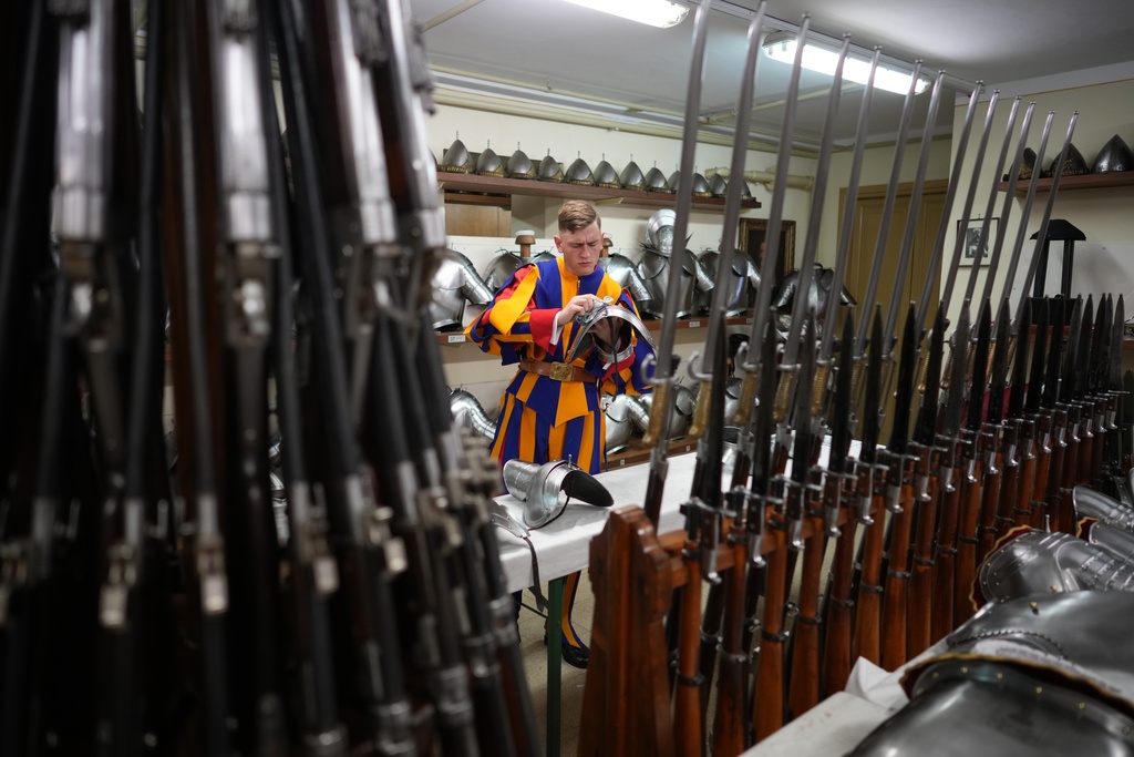 Pontifical Swiss Guards prepare ahead of their swearing in ceremony, at the Vatican, Saturday, Oct. 4, 2025. (AP Photo/Andrew Medichini)