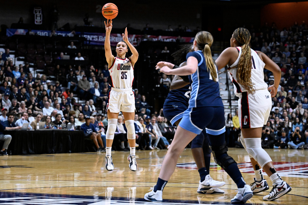 UConn guard Azzi Fudd (35) shoots during first half of an NCAA college basketball game against Villanova in the finals of the Big East tournament, Monday, March 9, 2026, in Uncasville, Conn. (AP Photo/Jessica Hill)