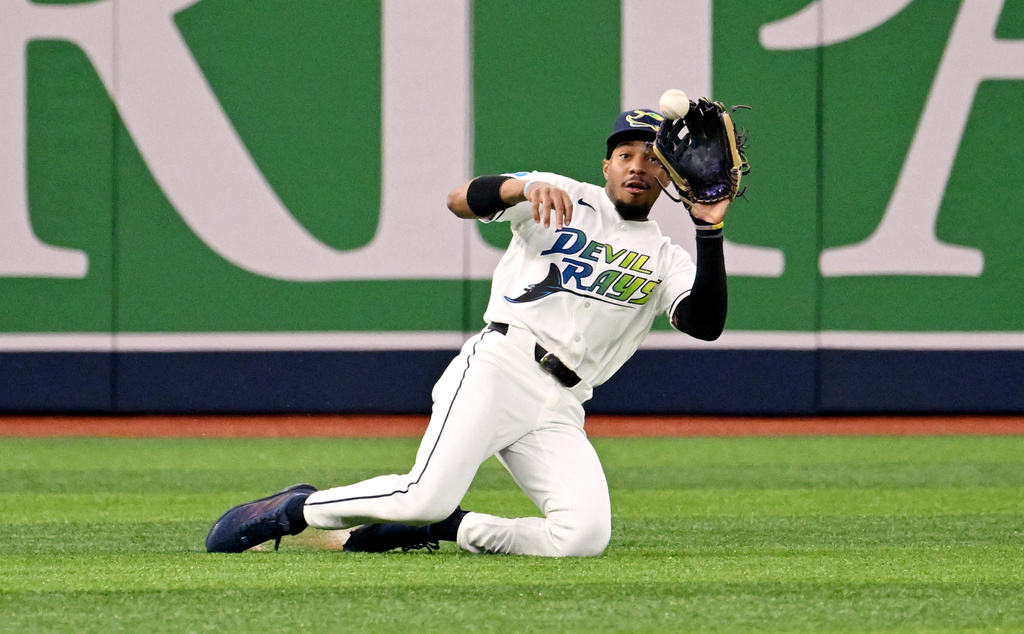 Tampa Bay Rays left fielder Chandler Simpson catches a line drive hit by Washington Nationals' Jorbit Vivas, not pictured, during the second inning of a baseball game Friday, June 19, 2026, in St. Petersburg, Fla. (AP Photo/Jason Behnken)