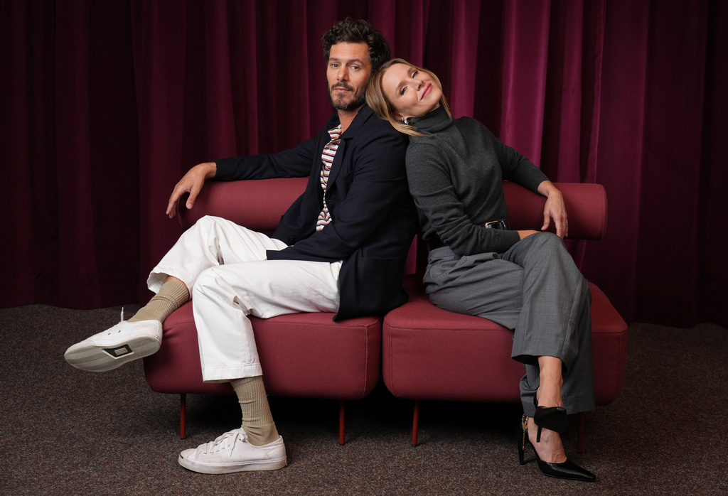 Adam Brody, left, and Kristen Bell, cast members in the Netflix series "Nobody Wants This," pose for a portrait in Los Angeles on Oct. 16, 2025. (AP Photo/Chris Pizzello)