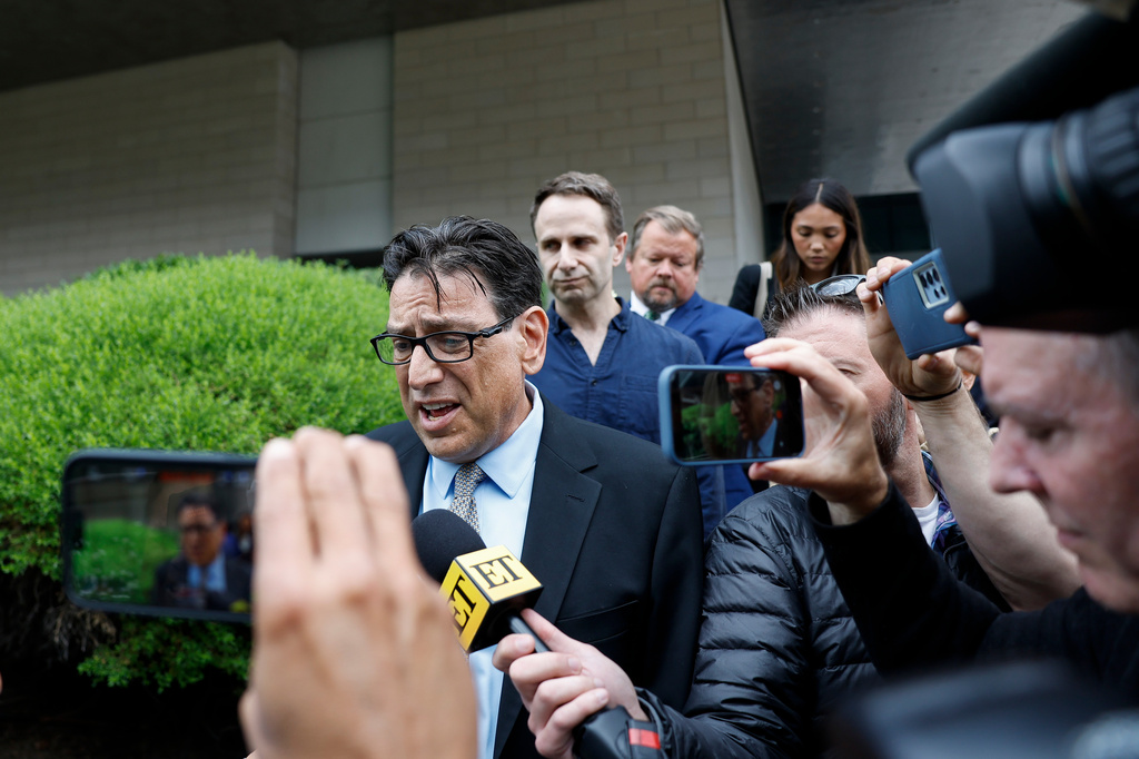 Erik Fleming departs federal court in Los Angeles after being sentenced in connection with the ketamine overdose death of actor Matthew Perry, on Wednesday, May 13, 2026, in Los Angeles. (AP Photo/Caroline Brehman)