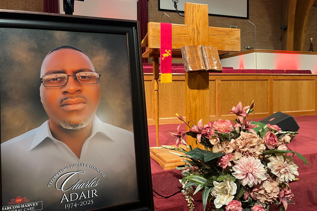 FILE - A portrait of Charles Adair, who died after a deputy kneeled on his back in a Kansas jail, is displayed at a news conference held by his family and their attorneys at Friendship Baptist Church in Kansas City, Mo., on Sunday, Sept. 23, 2025. (AP Photo/Heather Hollingsworth, File)