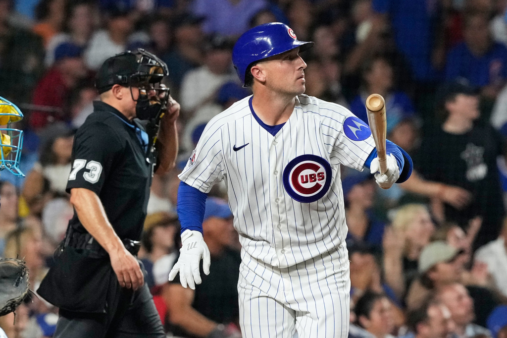 Chicago Cubs' Alex Bregman, right, watches his solo home run during the fourth inning of a baseball game against the Milwaukee Brewers in Chicago, Monday, Aug. 31, 2026. (AP Photo/Nam Y. Huh)