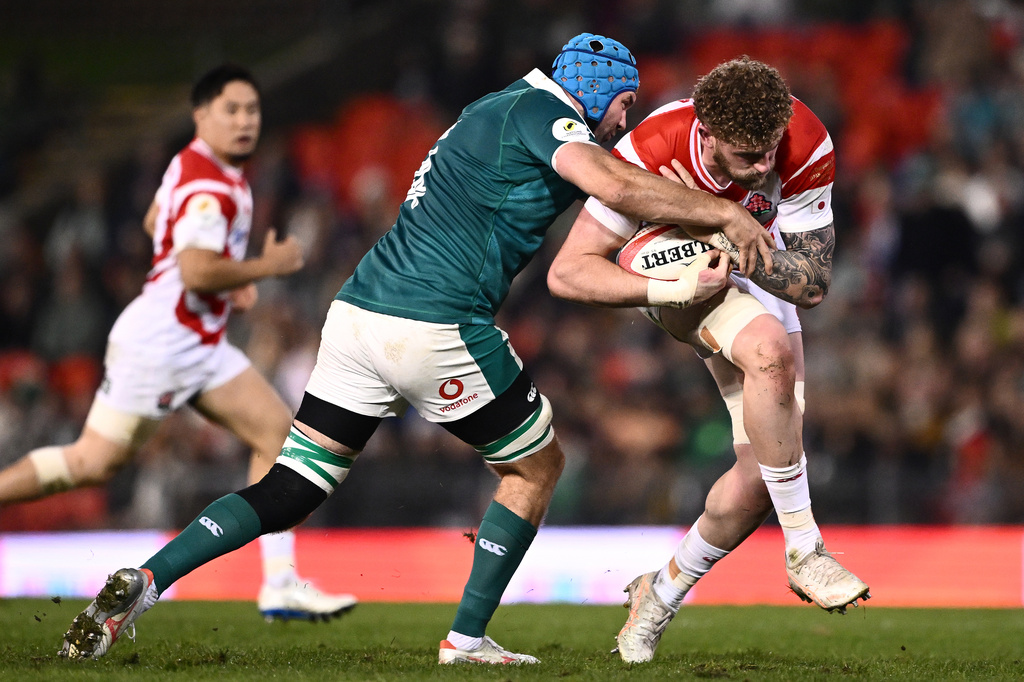 Warner Dearns of Japan is tackled by Tadhg Beirne of Ireland during the Nations Championship rugby international between Japan and Ireland in Newcastle, Australia, Saturday, July 11, 2026. (Dan Himbrechts/AAPImage via AP)