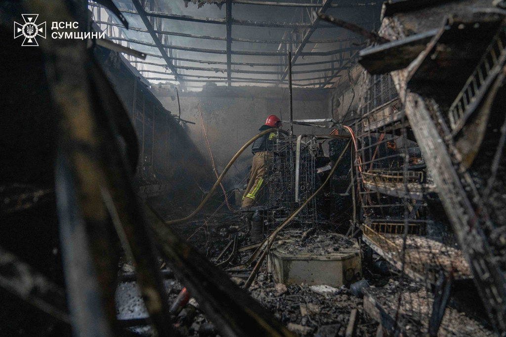 In this photo provided by the Ukrainian Emergency Service, firefighters put out a fire in a gas station following a Russian air attack in Sumy, Ukraine, Thursday, June 25, 2026. (Ukrainian Emergency Service via AP)