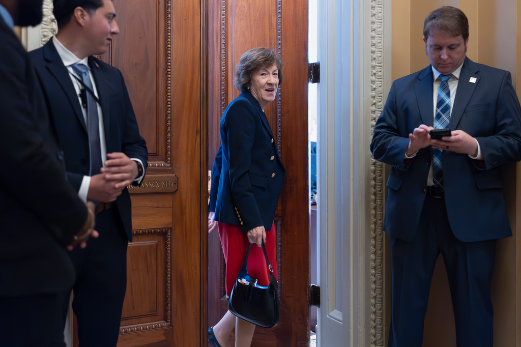Sen. Susan Collins, R-Maine, chair of the Senate Appropriations Committee, heads to the chamber before votes on the immigration enforcement funding package, at the Capitol in Washington, Thursday, June 4, 2026. (AP Photo/J. Scott Applewhite)