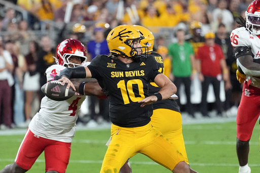 Arizona State quarterback Sam Leavitt throws against Houston during the first half of an NCAA college football game Saturday, Oct. 25, 2025, in Tempe, Ariz. (AP Photo/Ross D. Franklin) Arizona State quarterback Sam Leavitt throws against Houston during the first half of an NCAA college football game Saturday, Oct. 25, 2025, in Tempe, Ariz. (AP Photo/Ross D. Franklin)