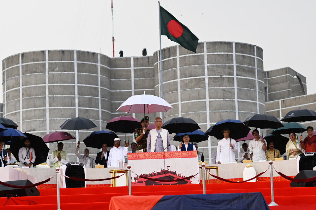 FILE - Head of the Bangladesh's interim government and Nobel laureate Dr. Muhammad Yunus attends an event during where the signing of a political charter called July National Charter was announced, outside Bangladesh's national parliament complex in Dhaka, Bangladesh, on Oct. 17, 2025. (AP Photo/Mahmud Hossain Opu, File)