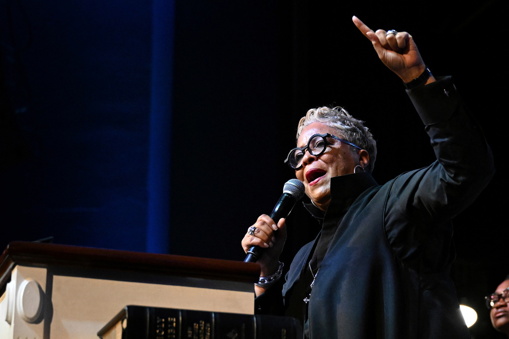 FILE - Rev. Gina Stewart preaches during church service at Rankin Chapel, April 7, 2024, in Washington. (AP Photo/Terrance Williams, File)