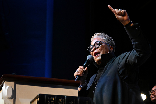 FILE - Rev. Gina Stewart preaches during church service at Rankin Chapel, April 7, 2024, in Washington. (AP Photo/Terrance Williams, File) FILE - Rev. Gina Stewart preaches during church service at Rankin Chapel, April 7, 2024, in Washington. (AP Photo/Terrance Williams, File)