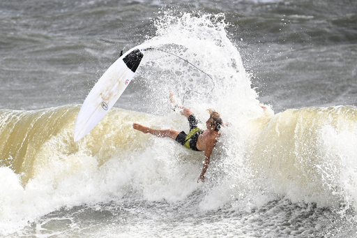 A surfer falls off of his board while taking advantage of the large waves kicked up by Tropical Storm Imelda as it passes offshore, Monday, Sept. 29, 2025, in Satellite Beach, Fla. (AP Photo/Phelan M. Ebenhack) A surfer falls off of his board while taking advantage of the large waves kicked up by Tropical Storm Imelda as it passes offshore, Monday, Sept. 29, 2025, in Satellite Beach, Fla. (AP Photo/Phelan M. Ebenhack)