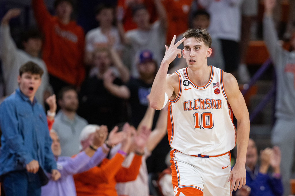Clemson forward Jake Wahlin (10) celebrates a 3-point basket against SMU during the first half of an NCAA college basketball game Wednesday, Jan. 7, 2026, in Clemson, S.C. (AP Photo/Scott Kinser)