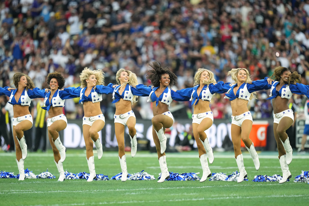 Dallas Cowboys cheerleaders perform before an NFL football game against the Baltimore Ravens in Rio de Janeiro, Sunday, Sept. 27, 2026. (AP Photo/Andre Penner)
