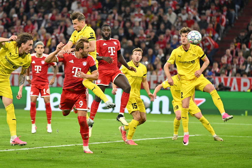 Bayern's Harry Kane, third from left bottom, scores his side's second goal during the Champions League opening phase soccer match between Bayern Munich and Bodo Glimt in Munich, Germany, Thursday, Sept. 10, 2026. (AP Photo/Lennart Preiss)