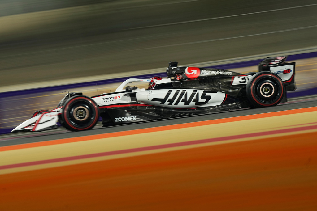 Haas driver Esteban Ocon of France steers his car during the second qualifying session at the Lusail International Circuit ahead of the Qatar Formula One Grand Prix, in Lusail, Qatar, Saturday, Nov. 29, 2025. (AP Photo/Fatima Shbair)