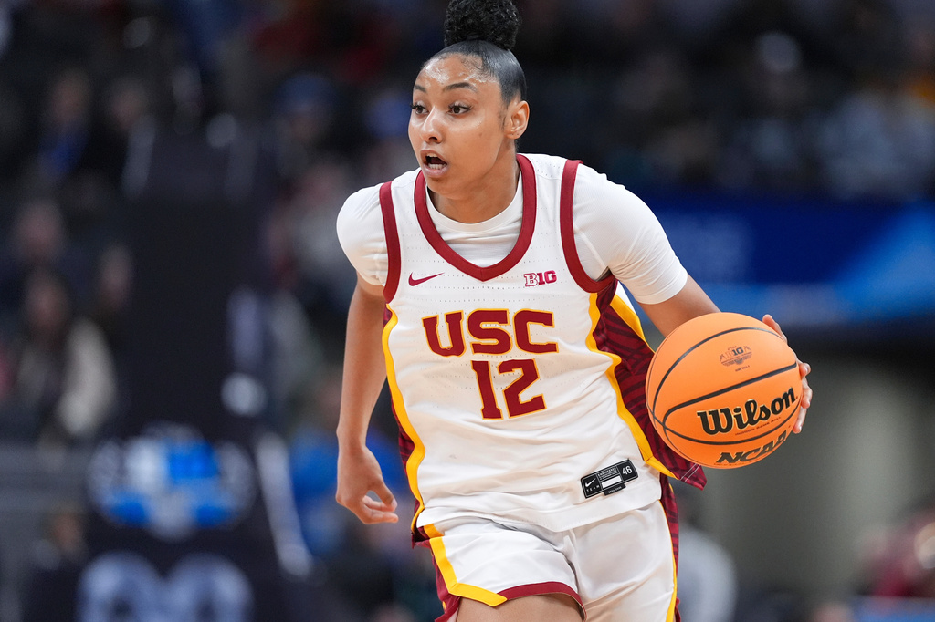 FILE - Southern California guard JuJu Watkins (12) plays against UCLA during the first half of an NCAA college basketball game in the championship of the Big Ten Conference tournament in Indianapolis, Sunday, March 9, 2025. (AP Photo/Michael Conroy, File)