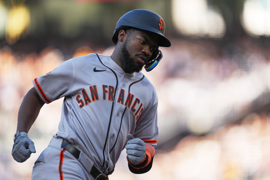 San Francisco Giants' Osleivis Basabe runs the bases after hitting a two-run home run during the third inning of a baseball game against the San Diego Padres Saturday, Aug. 1, 2026, in San Diego. (AP Photo/Gregory Bull)