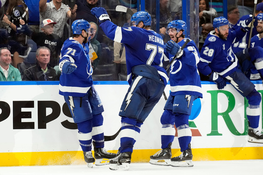 Tampa Bay Lightning center Anthony Cirelli (71) celebrates his game-winning goal against the Dallas Stars with defenseman Victor Hedman (77) and center Gage Goncalves (93) during overtime in an NHL hockey game Thursday, Oct. 30, 2025, in Tampa, Fla. (AP Photo/Chris O'Meara) Tampa Bay Lightning center Anthony Cirelli (71) celebrates his game-winning goal against the Dallas Stars with defenseman Victor Hedman (77) and center Gage Goncalves (93) during overtime in an NHL hockey game Thursday, Oct. 30, 2025, in Tampa, Fla. (AP Photo/Chris O'Meara)