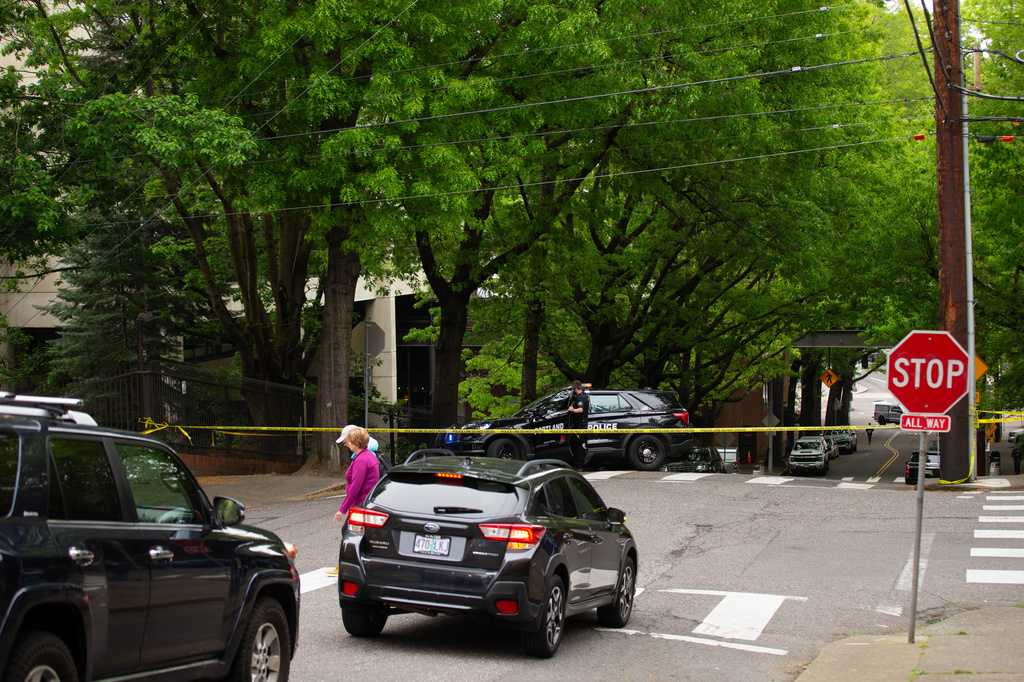 Police shut down the block surrounding the Multnomah Athletic Club in Northwest Portland, Ore., on Saturday, May 2, 2026. (Allison Barr/The Oregonian via AP)