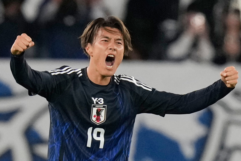 Japan's Koki Ogawa celebrates after winning against Brazil during their friendly soccer match Tuesday, Oct. 14, 2025, in Tokyo. (AP Photo/Eugene Hoshiko)