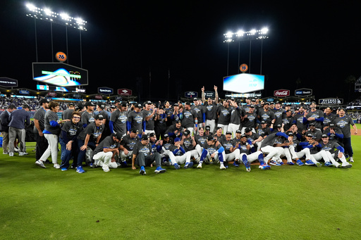 Los Angeles Dodgers pose after their win against the Milwaukee Brewers in baseball's National League Championship Series, Friday, Oct. 17, 2025, in Los Angeles. (AP Photo/Ashley Landis) Los Angeles Dodgers pose after their win against the Milwaukee Brewers in baseball's National League Championship Series, Friday, Oct. 17, 2025, in Los Angeles. (AP Photo/Ashley Landis)