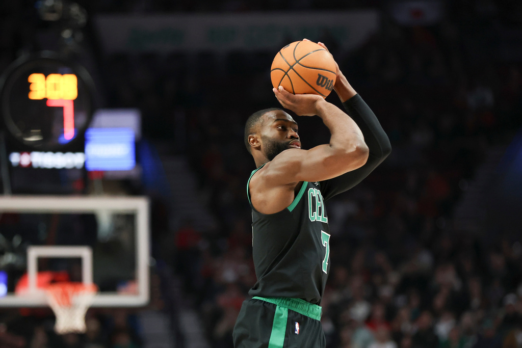 Boston Celtics guard Jaylen Brown shoots against the Portland Trail Blazers during the first half of an NBA basketball game, Sunday, Dec. 28, 2025, in Portland, Ore. (AP Photo/Amanda Loman)